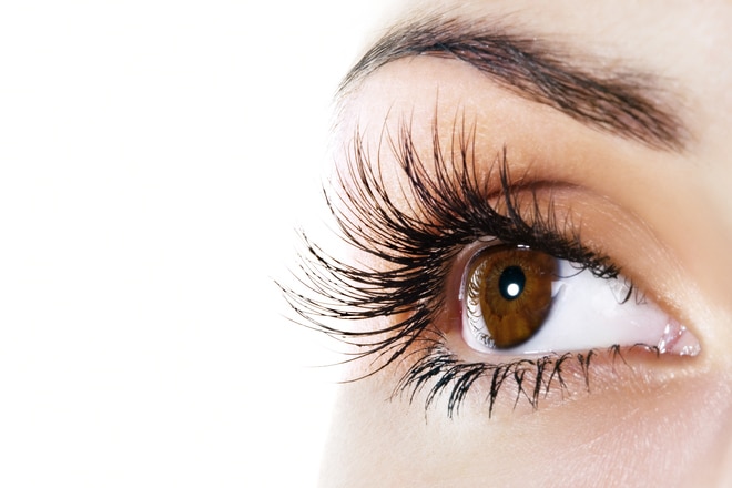 closeup of lash extensions on brown eyed woman