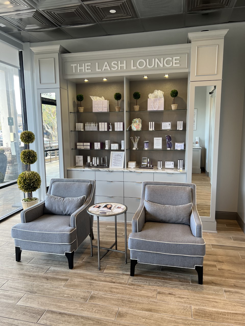 The Lash Lounge Manhattan Beach – Manhattan Marketplace retail wall and lobby.